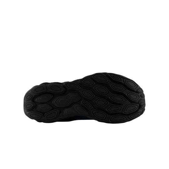 Black shoe outsole with geometric tread pattern