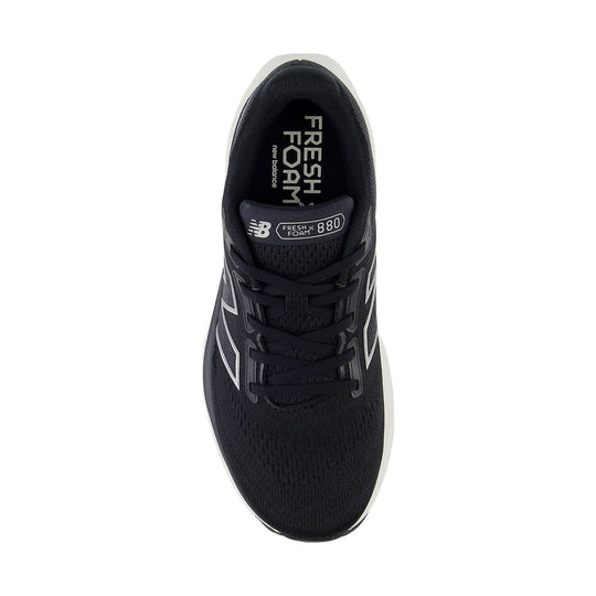 Black running shoe with white side logo, lace-up closure, and visible Fresh Foam 880 tongue label