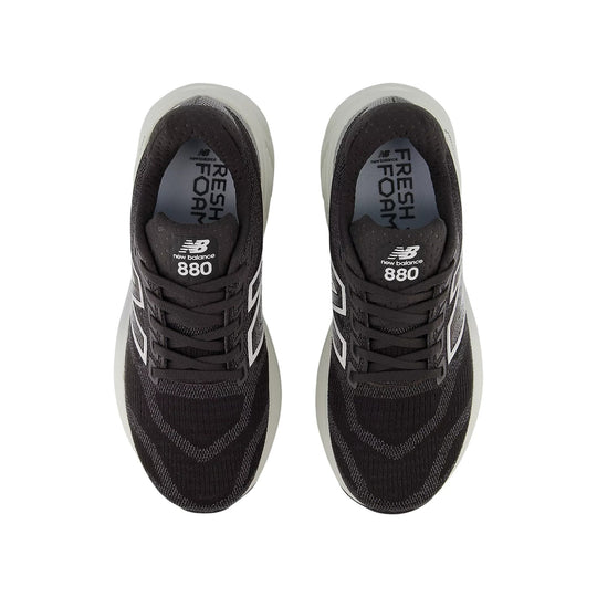 Pair of black running shoes with white midsoles, shown from above, with visible Fresh Foam and 880 branding on the insoles and tongues.
