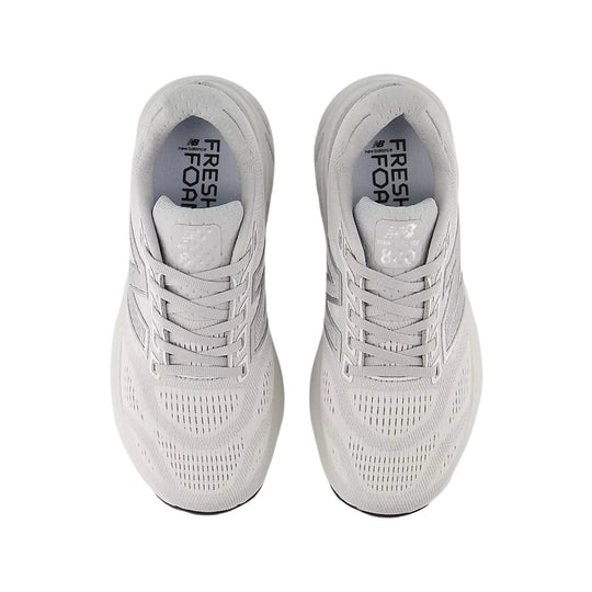 Pair of light gray running shoes with lace-up uppers and visible Fresh Foam insoles