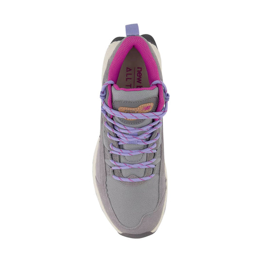 Gray and lavender mid-top hiking shoe with bright pink collar and purple laces, viewed from above