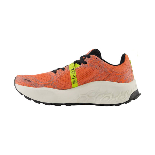 Orange trail running shoe with black laces, white midsole, and neon yellow side tab