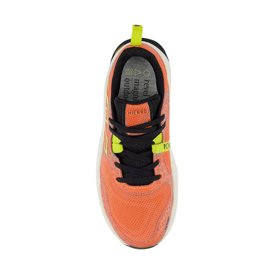 Coral and black trail running shoe viewed from above with neon yellow laces and heel pull tab