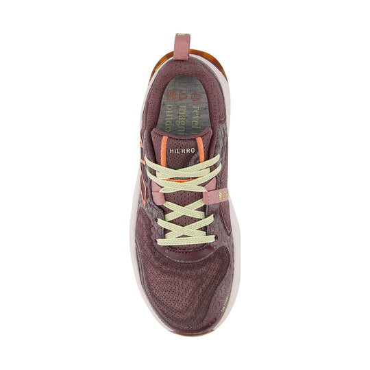 Top view of a mauve trail running shoe with cream laces and visible HIERRO branding