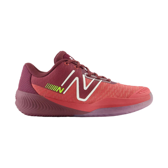 Maroon and red tennis shoe with a white side logo, laces, and a translucent sole, side view
