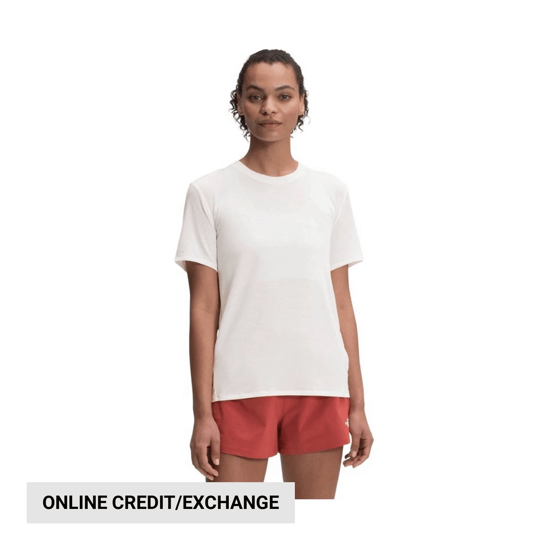 White short-sleeve crewneck T-shirt on a model with a banner reading “ONLINE CREDIT/EXCHANGE”