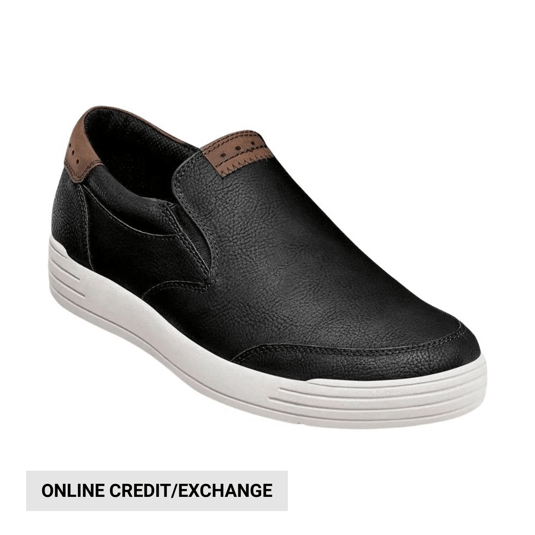 Black slip-on sneaker with brown heel tab, white sole, and online credit/exchange text