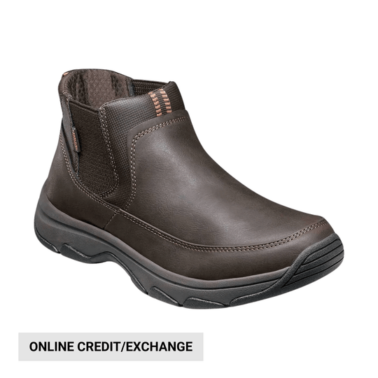 Brown leather ankle boot with elastic side panels and thick black sole