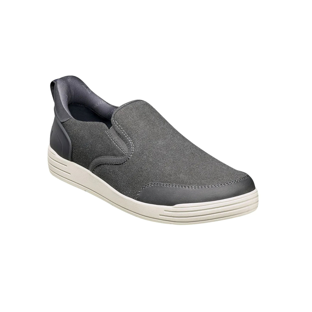 Gray slip-on casual shoe with a canvas upper, white sole, and black heel panel