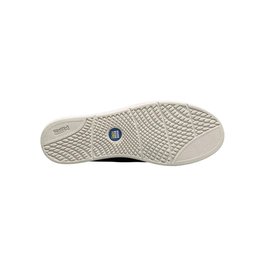 Light beige shoe outsole with textured tread and a circular Nunn Bush Kore logo