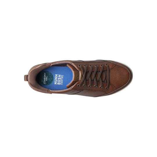 Brown leather oxford shoe viewed from above with blue insole and lace-up front