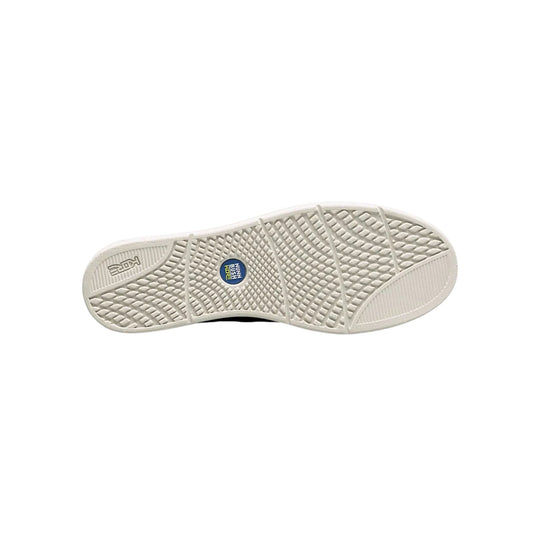 Off-white shoe outsole with diamond tread pattern and a blue Nunn Bush H2 insert