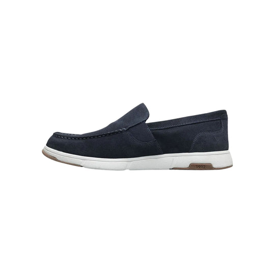 Navy suede slip-on loafer with white sole and brown heel detail