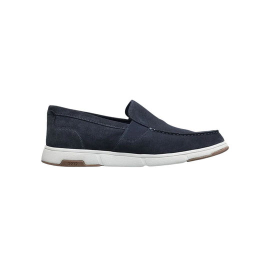 Navy suede slip-on loafer with a white sole and brown outsole accents