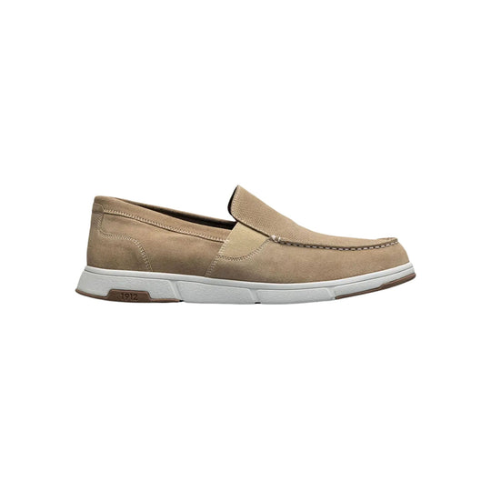 Tan suede slip-on loafer with moc toe and white sole