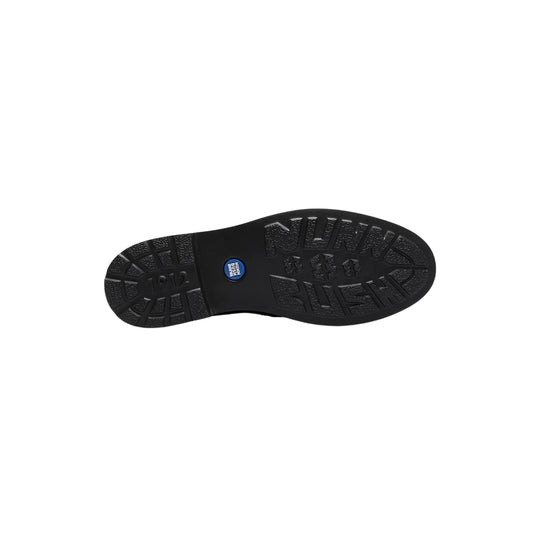 Black rubber shoe outsole with Nunn Bush branding and tread pattern