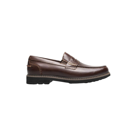 Brown leather penny loafer with moc toe, stitching details, and a black lug sole