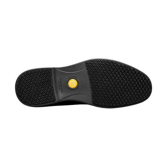 Black work shoe outsole with diamond tread and yellow heel insert