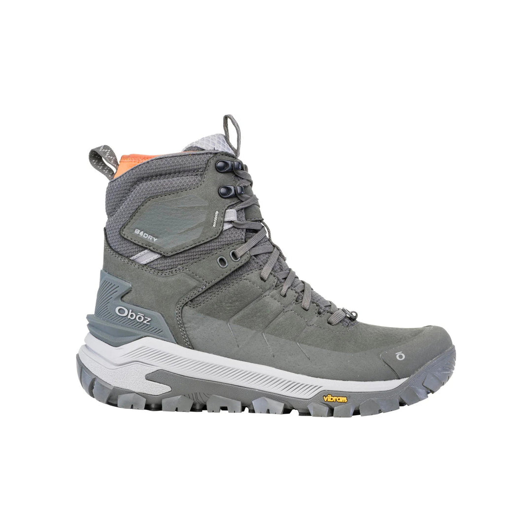Gray mid-height insulated hiking boot with laces, pull tabs, and rugged tread