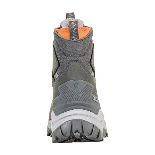Rear view of a gray hiking boot with an orange collar, pull tab, and thick lugged outsole