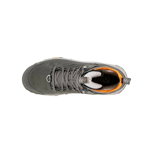 Gray mid-top hiking boot with orange collar lining and thick laces, shown from above on a white background