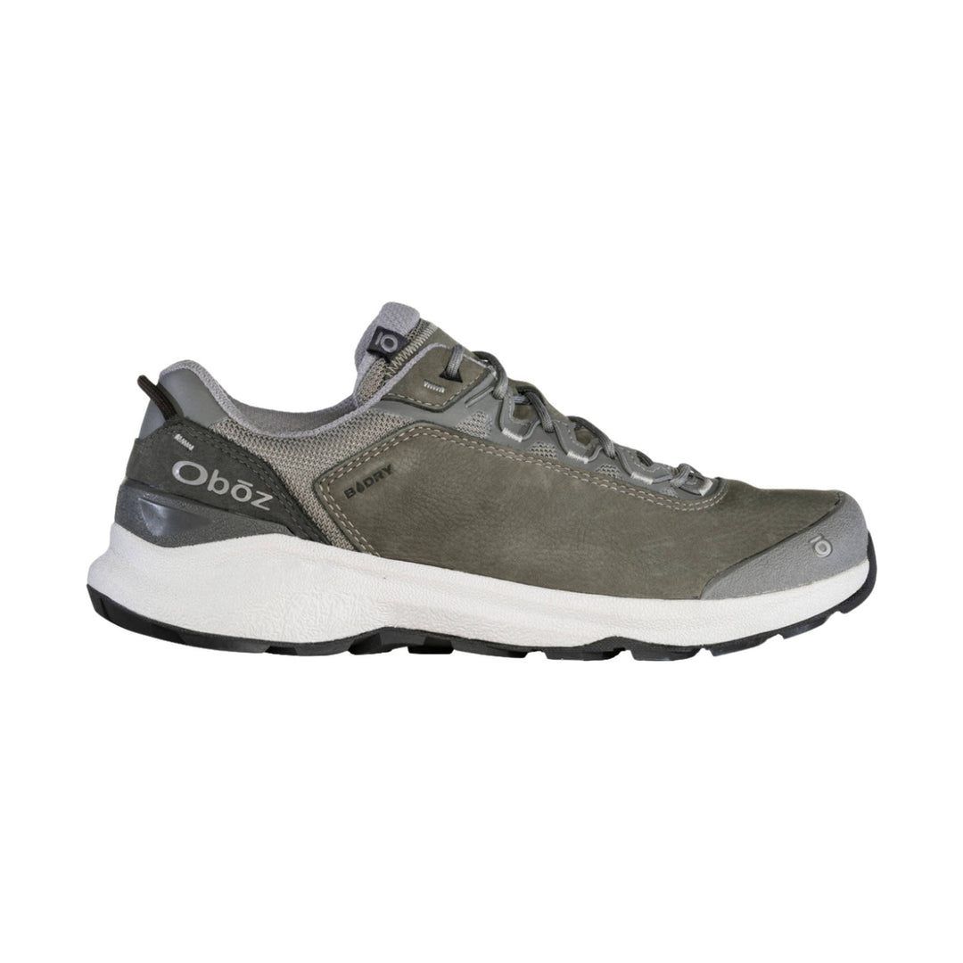 Gray low-cut hiking shoe with mesh panels, leather overlays, and a thick white midsole