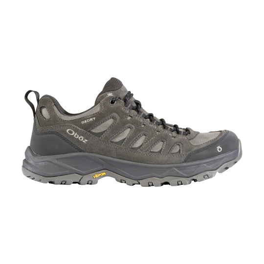 Gray low-top hiking shoe with mesh panels, black laces, and rugged tread