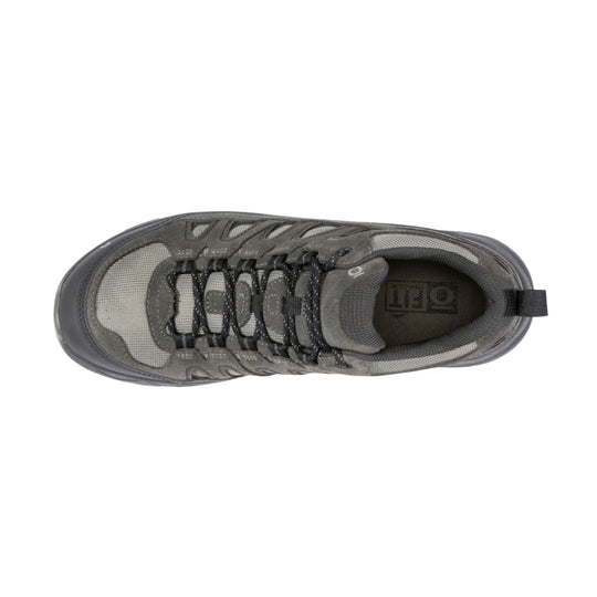 Gray low-top hiking shoe with mesh upper, black laces, and a heel pull tab, shown from above
