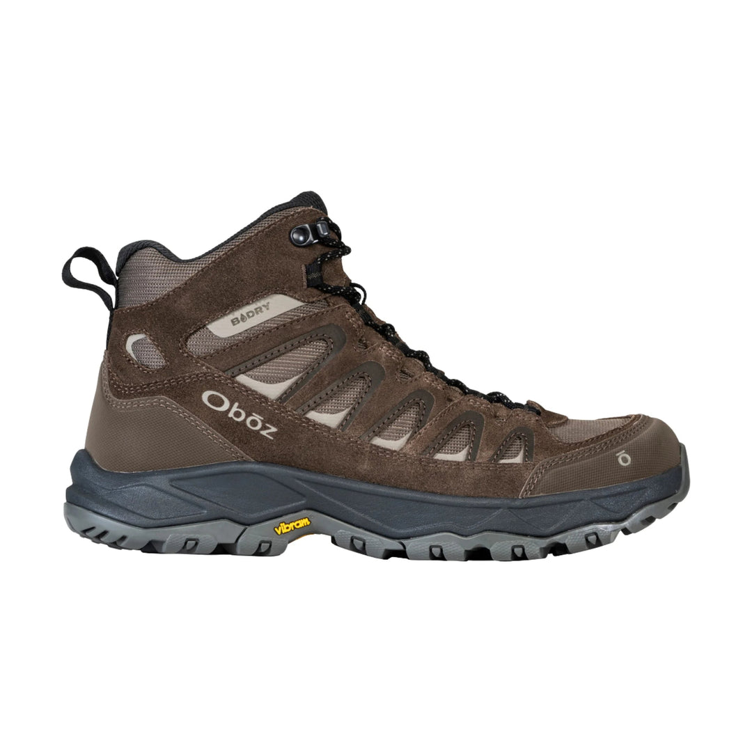 Brown mid-height hiking boot with black laces, mesh panels, and a gray lugged sole