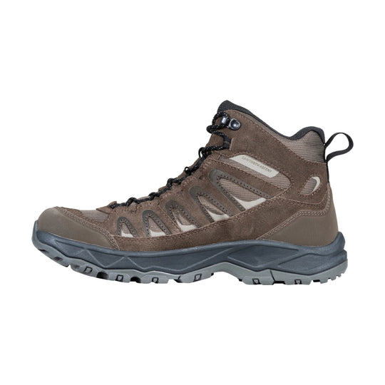 Mid-height brown hiking boot with black laces, suede panels, and a gray treaded sole.
