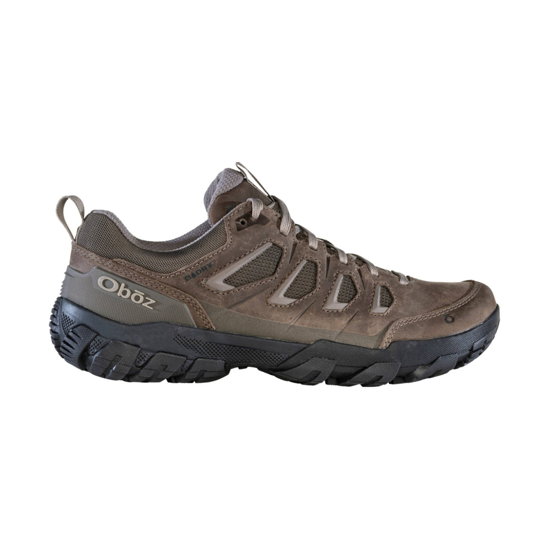Brown low-cut hiking shoe with mesh panels, reinforced overlays, and a black lugged sole