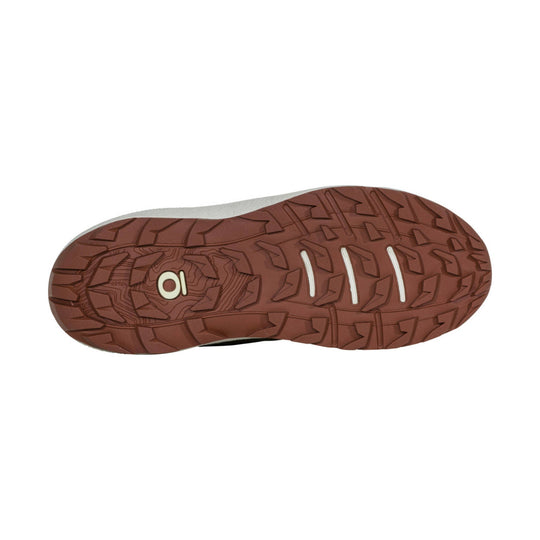 Brown lugged hiking shoe outsole with white flex grooves