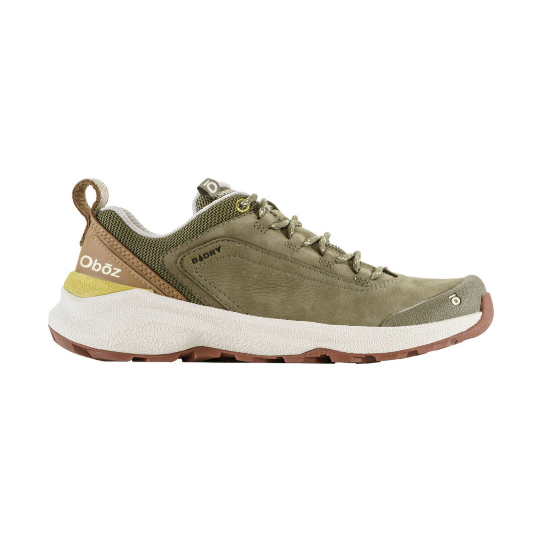 Olive low-top hiking shoe with white chunky sole, bungee laces, and rear pull loop