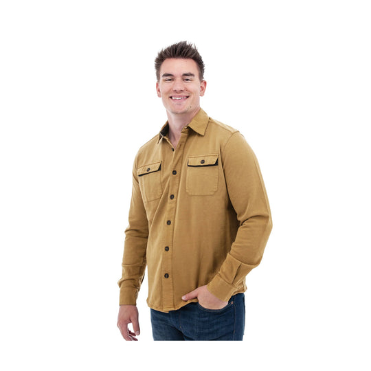 Tan long-sleeve button-up shirt with two chest flap pockets, worn with jeans