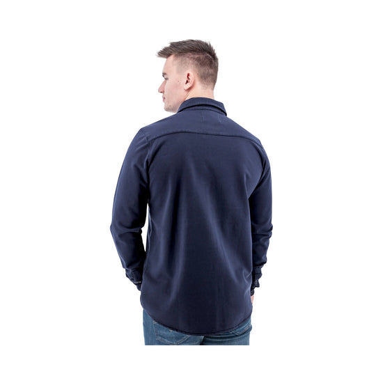 Navy long-sleeve button-up shirt shown from the back on a model