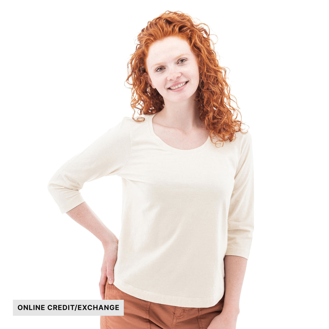 Cream three-quarter sleeve top with a wide scoop neckline and online credit/exchange label