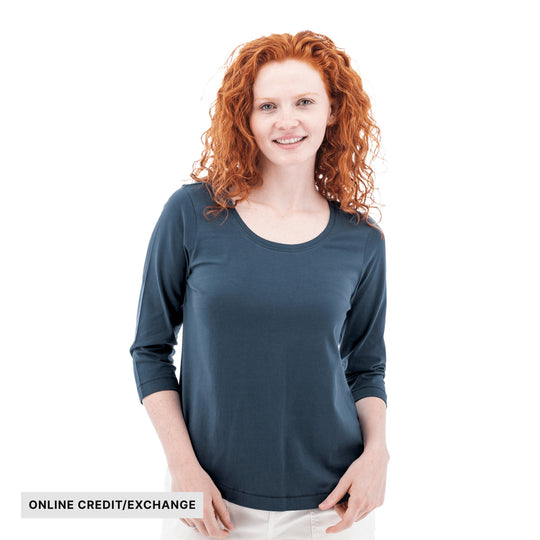 Dark blue three-quarter sleeve top with a scoop neck, shown on a model; banner reads "ONLINE CREDIT/EXCHANGE"