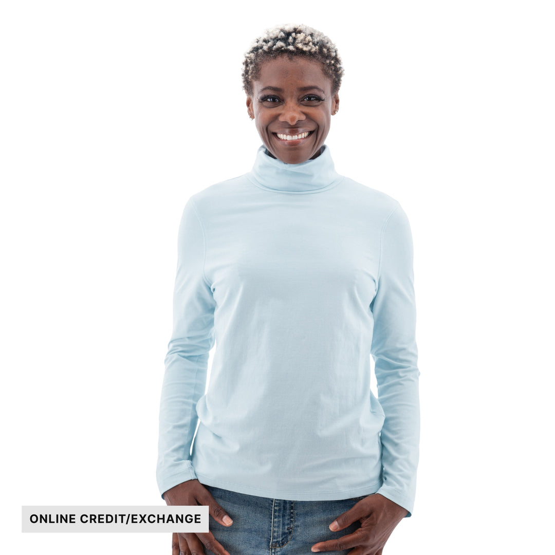 Light blue long-sleeve turtleneck shirt with visible "ONLINE CREDIT/EXCHANGE" text