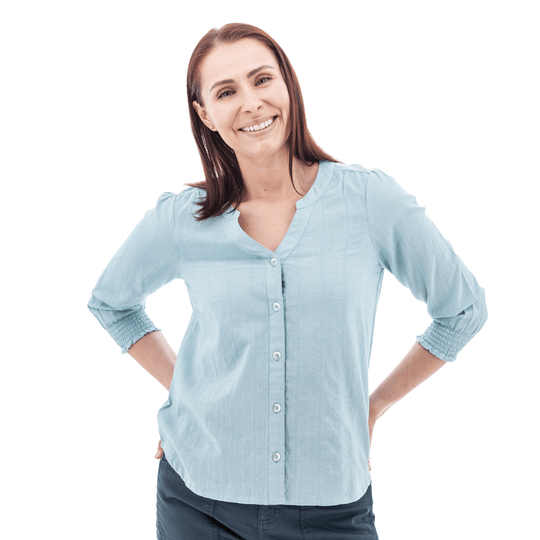 Light blue blouse with three-quarter smocked sleeves and button front