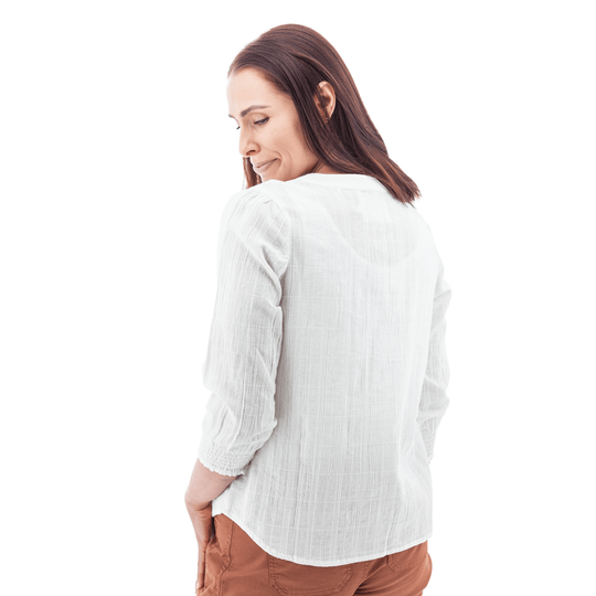 White long-sleeve blouse shown from the back