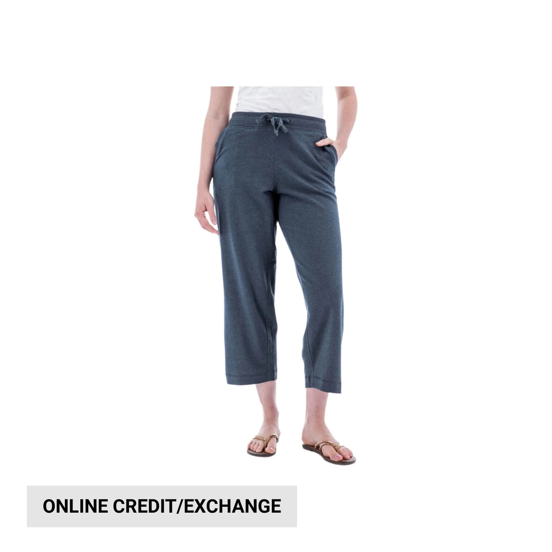 Croppped navy drawstring sweatpants with side pockets and a wide cuffed hem