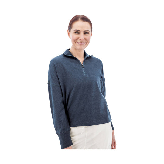 Woman wearing a navy quarter-zip pullover with a mock neck and long sleeves