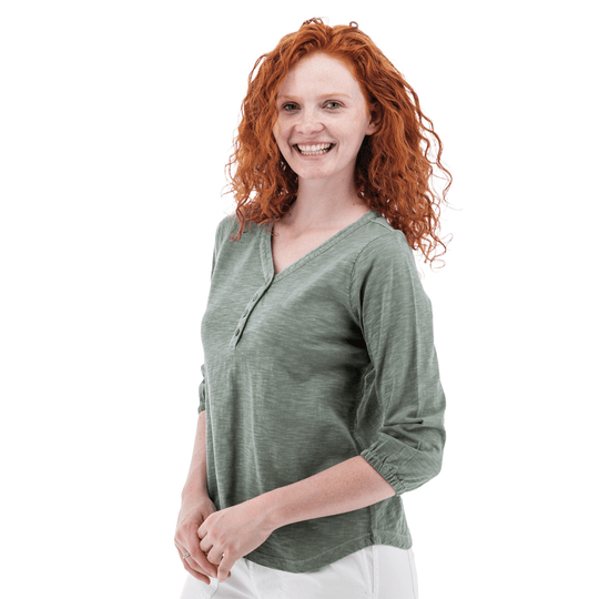 Women’s sage green V-neck henley top with three-button placket and three-quarter sleeves