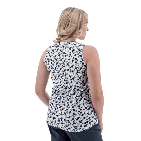 White sleeveless floral top with black pattern, shown from the back