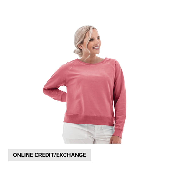 Pink long-sleeve sweatshirt on a model with a ribbed hem and cuffs