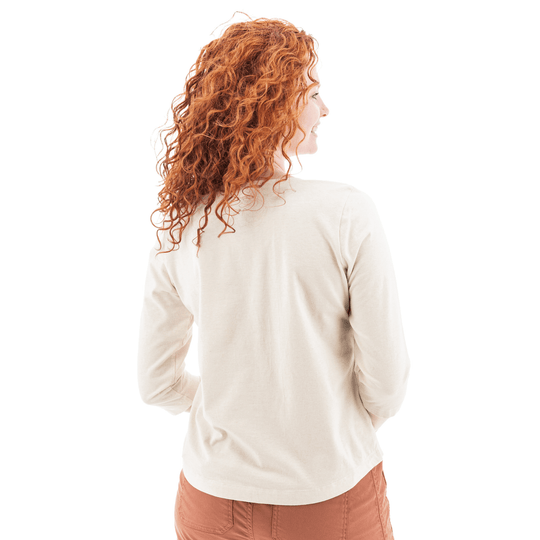 Woman modeling an ivory three-quarter sleeve top, shown from the back