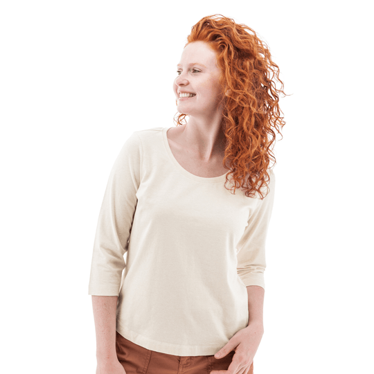 Cream three-quarter sleeve top on a model