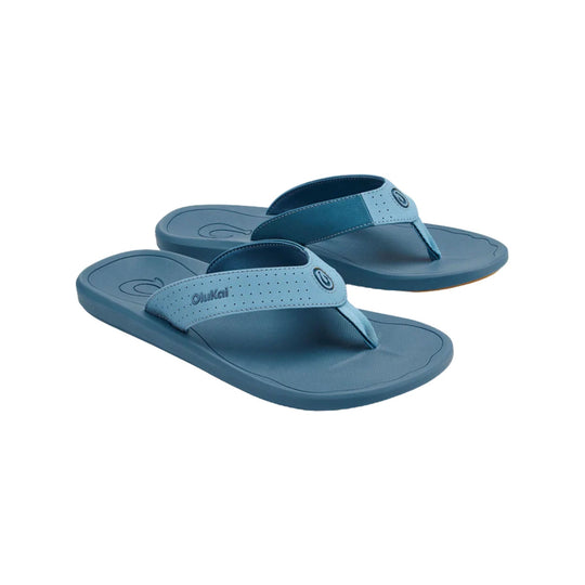 Blue flip-flop sandals with wide textured straps and molded footbeds