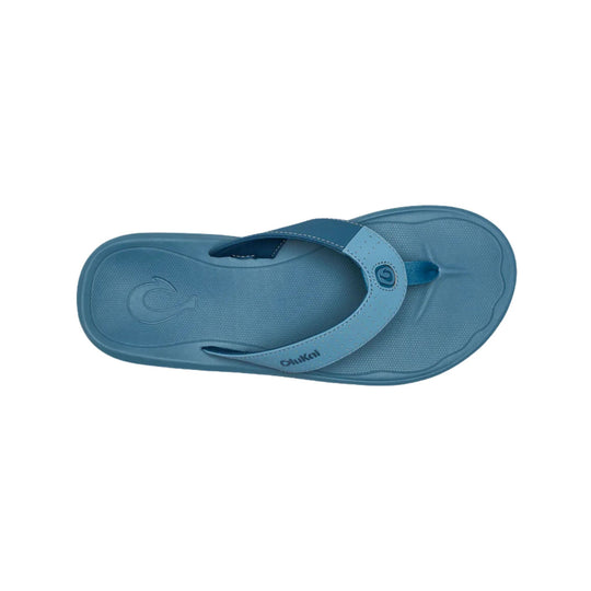 Blue thong sandal with a wide strap, textured footbed, and visible OluKai logo