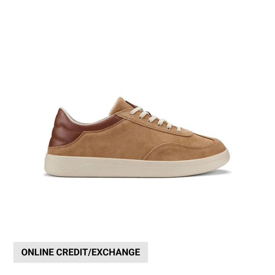 Tan suede low-top sneaker with white laces, brown heel panel, and cream sole
